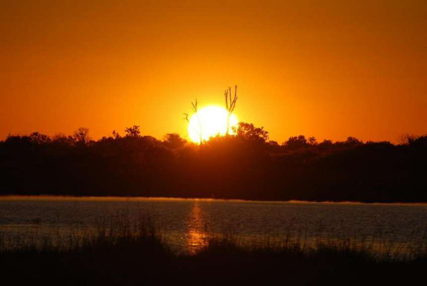 Sonnenuntergang im Okavango-Delta