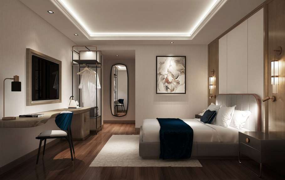 Ein Hotelzimmer mit einem Bett und einem Schreibtisch