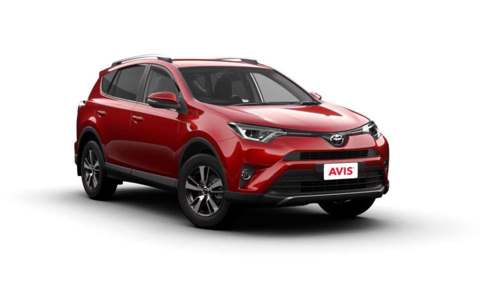 Ein rotes toyota-auto mit einem avis-schild darauf