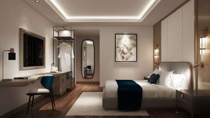 Ein Hotelzimmer mit einem Bett und einem Schreibtisch