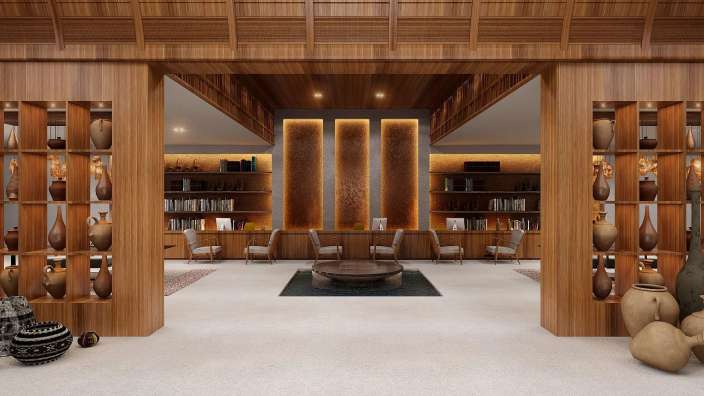 Ein Wohnzimmer mit vielen Vasen und Bücherregalen