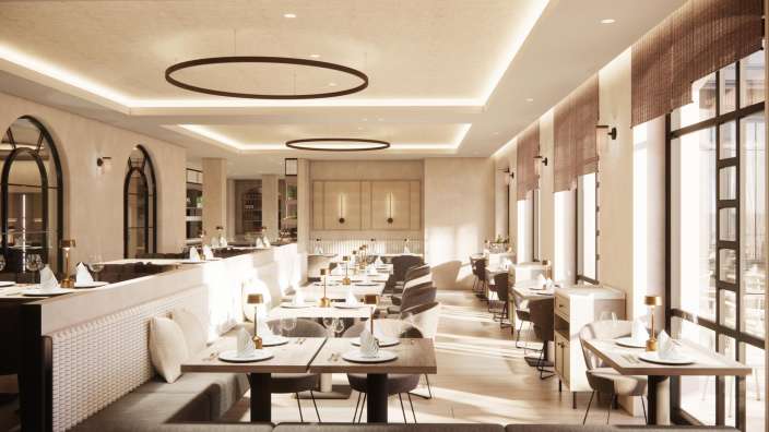 Ein Esszimmer mit vielen Tischen und Stühlen