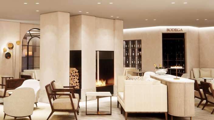 Ein Wohnzimmer mit einem Kamin und einem Schild, das sagt bodega